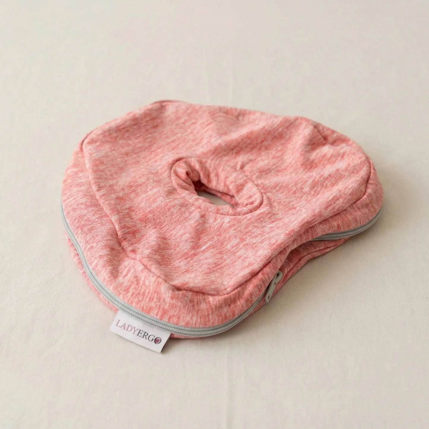 Housse de rechange coussin pour genoux LadyErgo coloris rose poudré, vue de dessus sur fond neutre