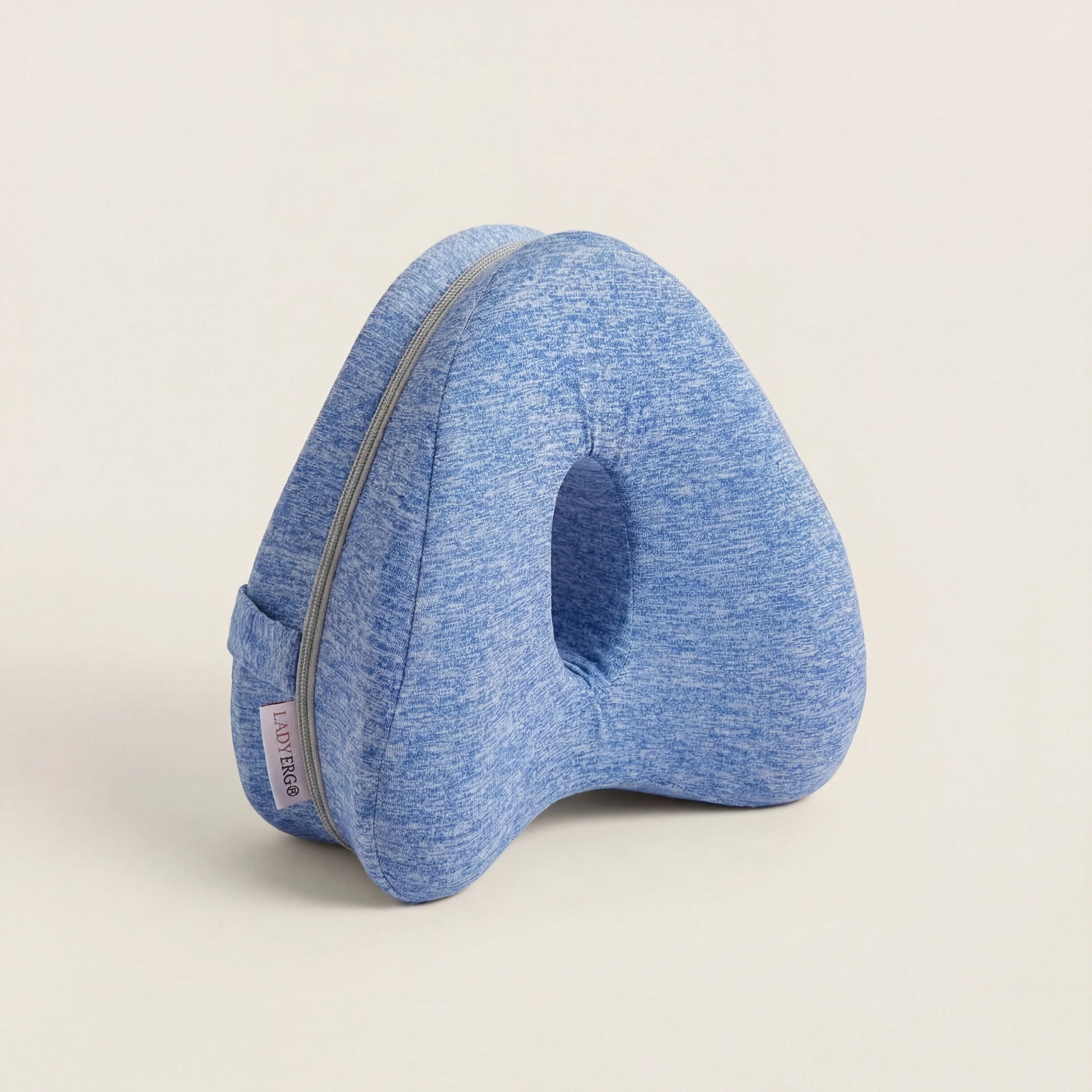 Coussin pour genoux LadyErgo coloris bleu, forme ergonomique pour dormir sur le côté