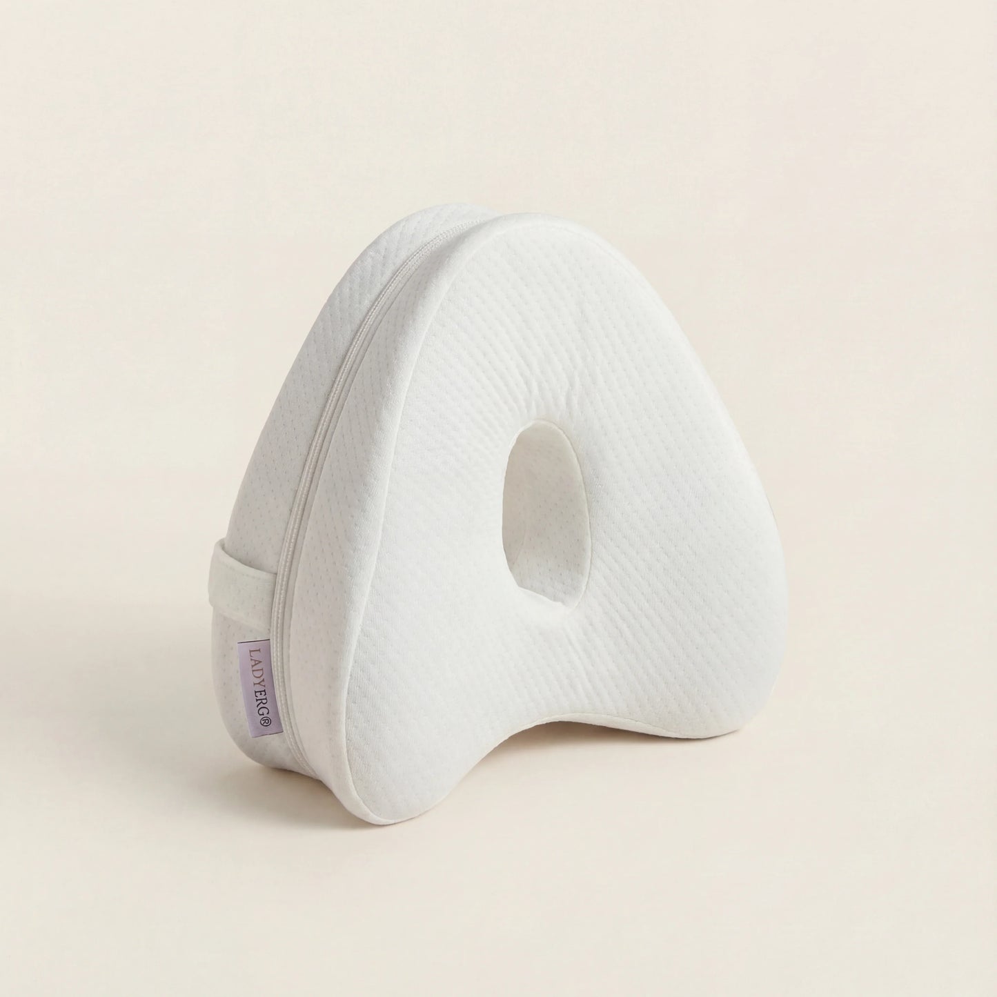 Coussin pour genoux LadyErgo coloris blanc, maintien naturel des jambes pendant le sommeil