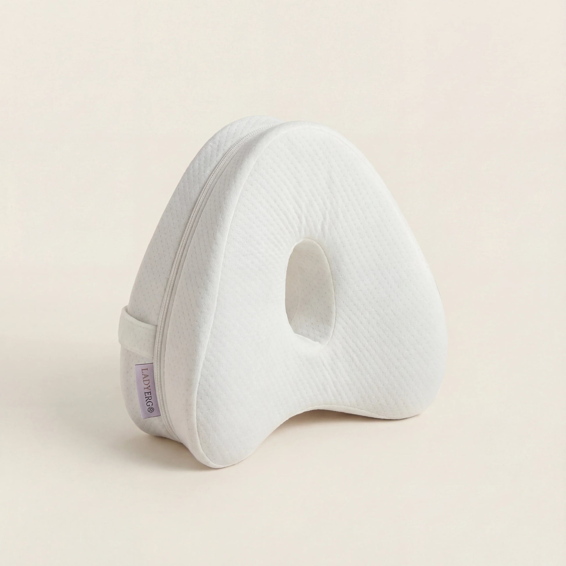 Coussin pour genoux LadyErgo coloris blanc, maintien naturel des jambes pendant le sommeil