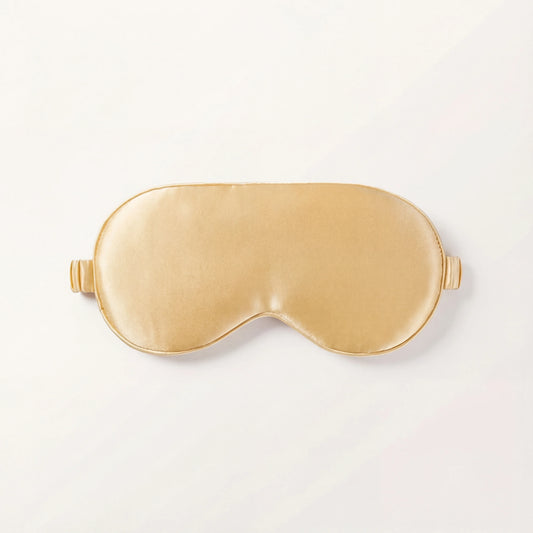 Masque de sommeil en soie LadyErgo coloris champagne, doux et confortable pour la nuit
